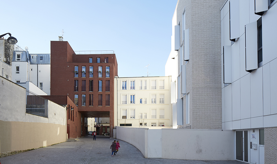 Construction d'un immeuble de logements brique rouge soon architecte vue globale